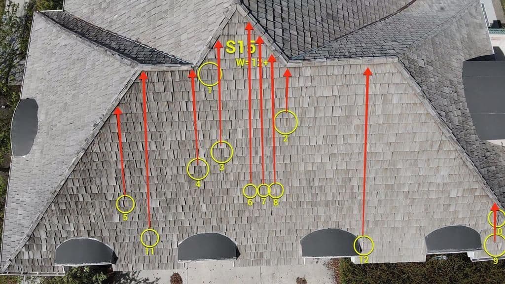 The same slope with arrows from each damaged shake running up to the ridge