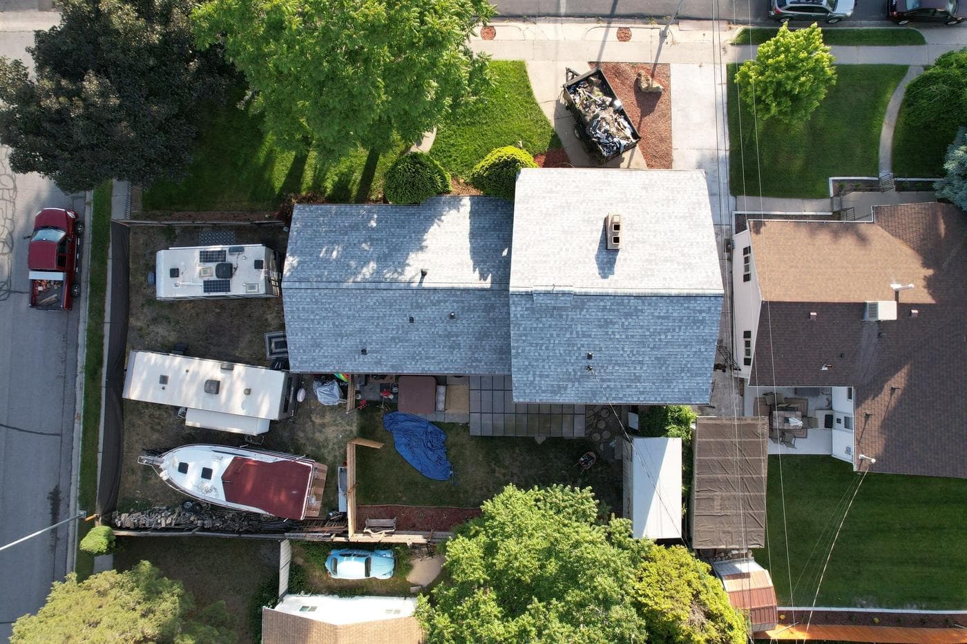 Aerial view of the completed grey shingle roof in Provo